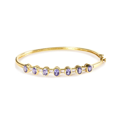 14K Yellow Gold Alternating Bezel Set 5MM Oval Shaped Tanzanite and 1/5 Cttw Diamond Bangle Bracelet (H - I Color, VS2 - SI1 Clarity) - Fit's wrists up to 7.25" Inches | | Elegant Emulations Jewelry USA