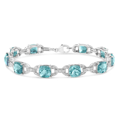 .925 Sterling Silver 7x7 mm Cushion Cut Blue Topaz and 1/20 cttw Round Cut Diamond Fashion Tennis Bracelet (I - J Color, I1 - I2 Clarity) - 7" | | Elegant Emulations Jewelry USA