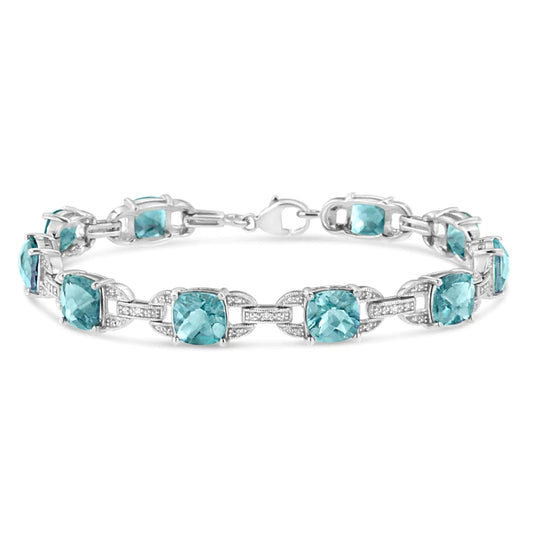 .925 Sterling Silver 7x7 mm Cushion Cut Blue Topaz and 1/20 cttw Round Cut Diamond Fashion Tennis Bracelet (I - J Color, I1 - I2 Clarity) - 7" | | Elegant Emulations Jewelry USA