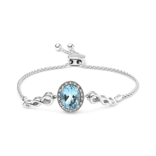 .925 Sterling Silver 10x8mm Oval Blue Topaz and Diamond Accent Lariat 4”-10” Adjustable Bolo Bracelet (H-I Color, SI1-SI2 Clarity) - Elegant Emulations